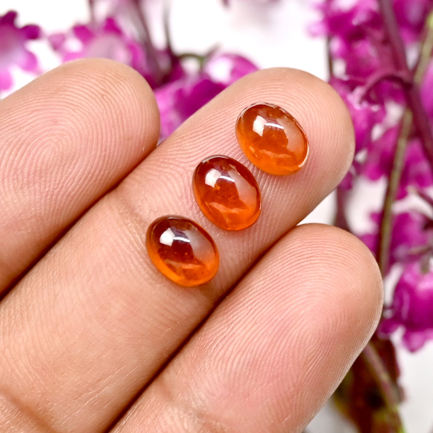 40.50cts Spessartine Garnet Smooth 6x8mm Oval Cabochon AAA Grade Gemstone Parcel - Total 25 Pcs